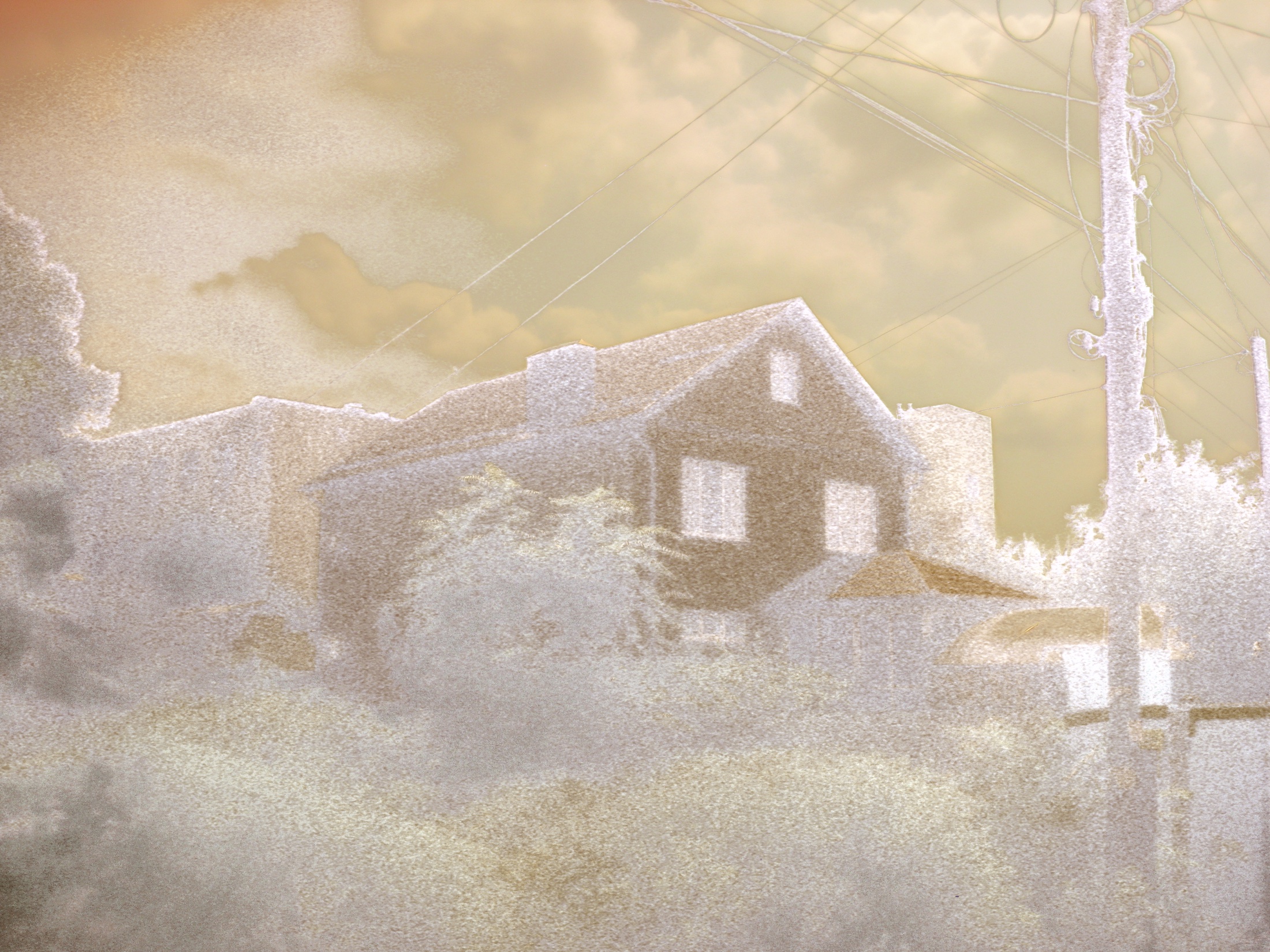 Low buildings and a larger city structure occupying two scales in one altered view.