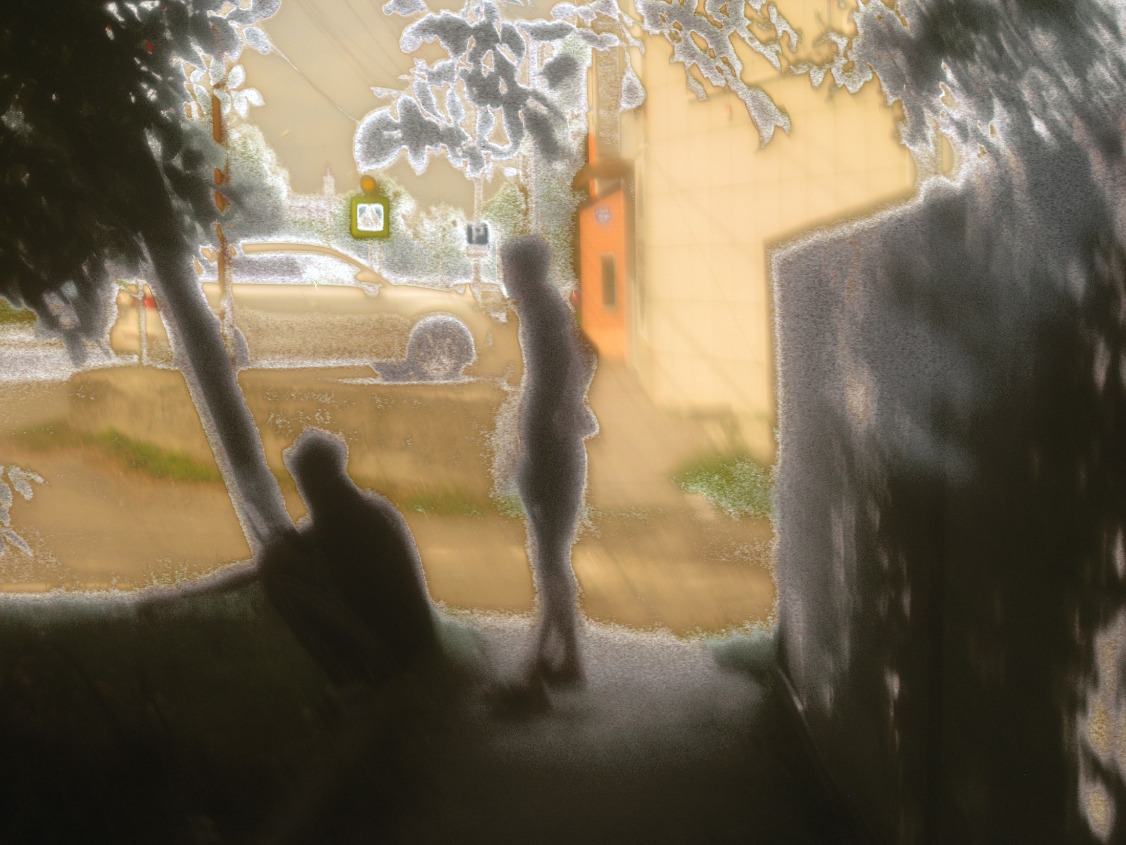A dark threshold formed by shadow and the handmade filter.