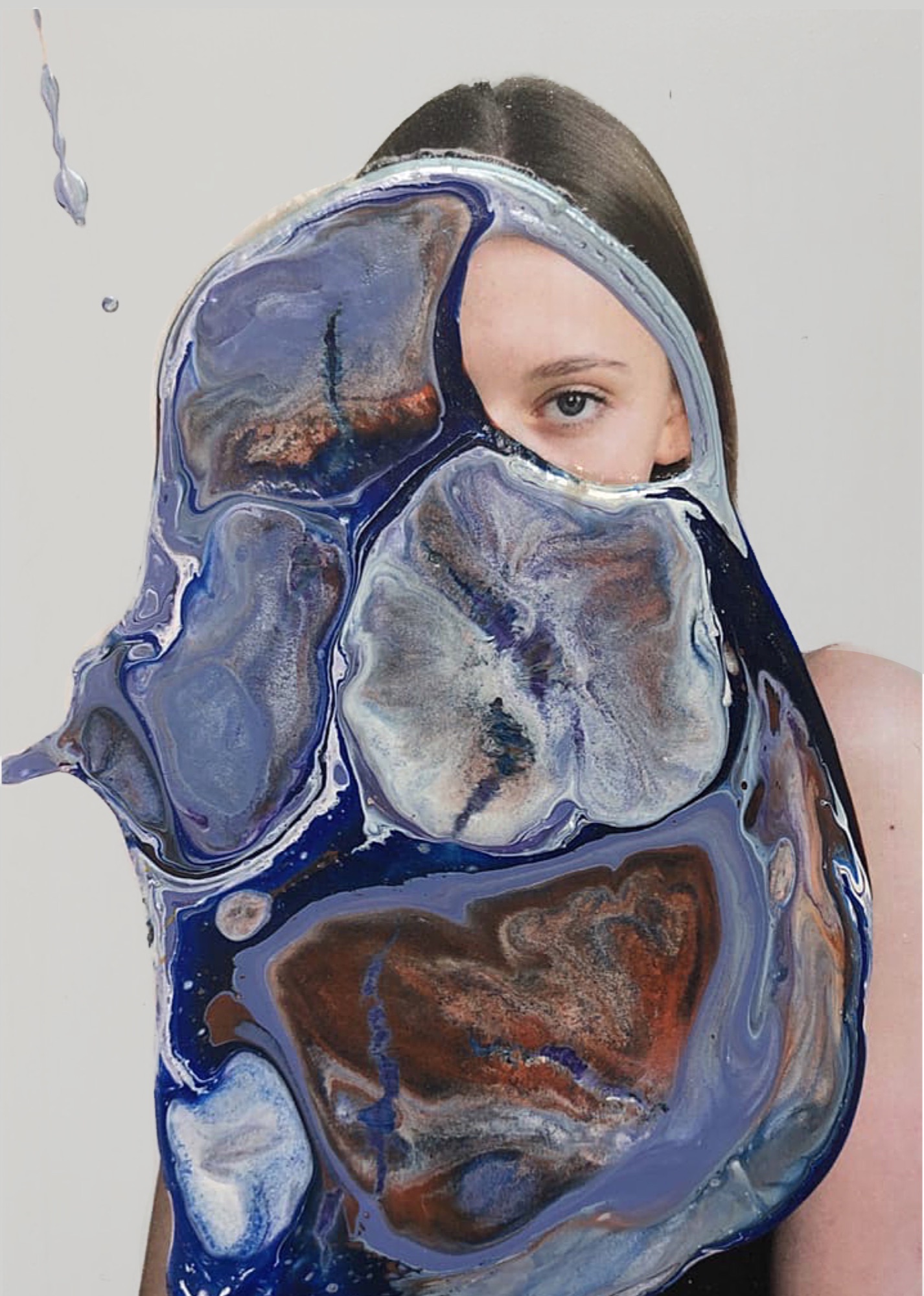 A model's eye visible above a large blue-grey acrylic membrane